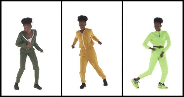 アフリカ系アメリカ人女性がヒップホップを踊る3つのクリップの分割画面コラージュ 色々な色のトラックスーツを着た同じ人 ヒップホップの動きだ 白地に隔離された — ストック動画