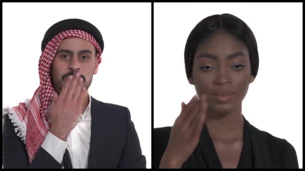 一个年轻的阿拉伯男人和一个非洲女人的特写镜头 他们双唇紧闭 手牵着手 以传递空气之吻 身体语言 纵向拼贴 — 图库视频影像