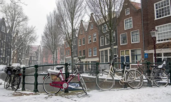 Snowing in the city Amsterdam the Netherlands