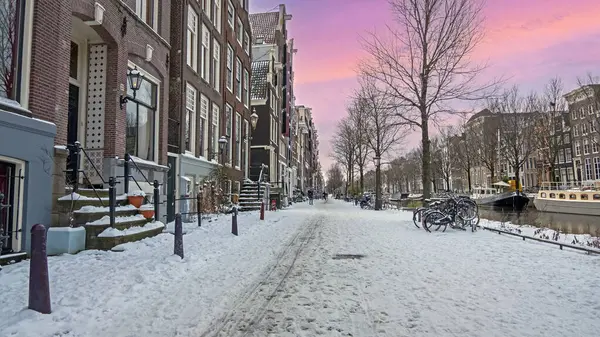 Cidade Nevada Amsterdã Nos Países Baixos Inverno Pôr Sol Fotos De Bancos De Imagens Sem Royalties