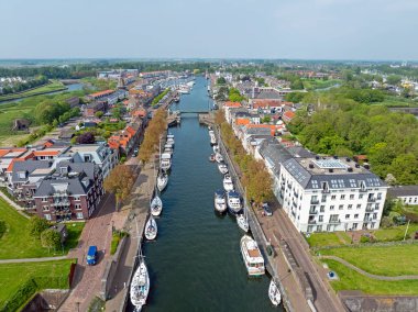 Aerial from the town Hellevoetsluis with the lighthouse in the Netherlands clipart