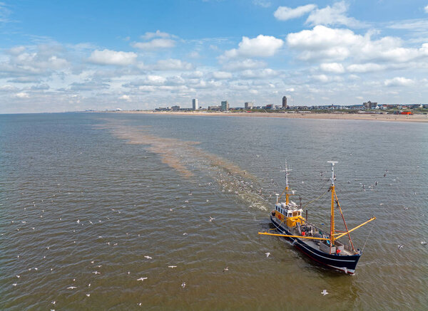 Aerial from a fishing trawler at the North Sea coast near Zandvoort in the Netherlands