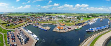 Aerial panorama from the historical town Oudeschild on Texel island in the Netherlands clipart