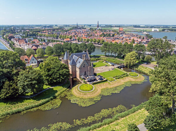 Aerial from the historical city Medemblik with the Radboud castle in the Netherlands