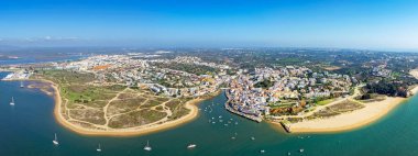 Aerial panorama from the little historical village Ferragudo in the Algarve Portutgal clipart