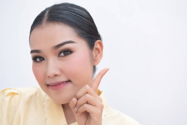 asian plus size woman pointing up confident winning one finger sign for number one or first point leader concept clipart