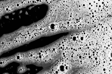 Soyut arka plan beyaz sabunlu köpük dokusu. Köpüklü şampuan köpüğü.