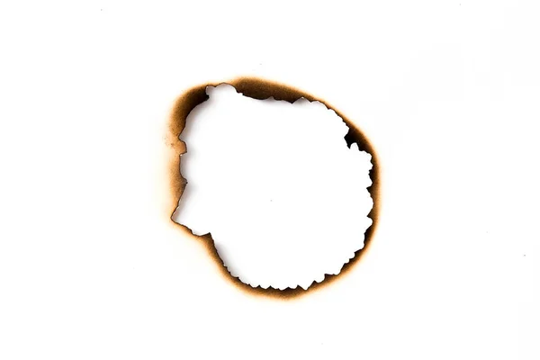 Lubang Dibakar Dalam Selembar Kertas Terisolasi Pada Latar Belakang Putih — Stok Foto
