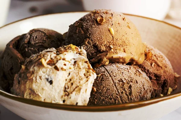 Chocolate and vanilla ice cream bowl dessert close up