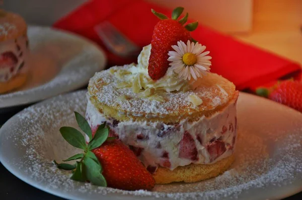 strawberry cream cake on plate