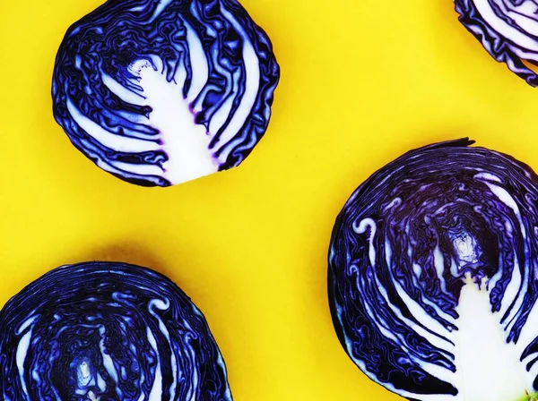 stock image Purple cabbage on yellow background