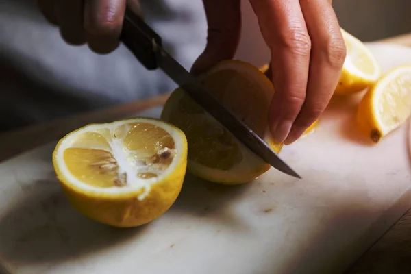 Cook Cutting Fresh Yellow Lemon — Stock Photo, Image