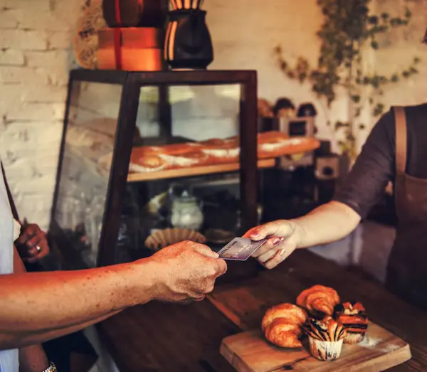 stock image People hands credit card payment bakery