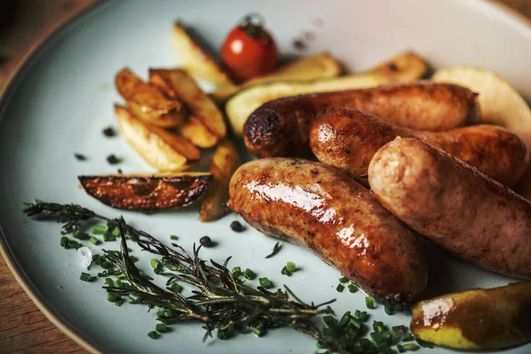 stock image Sausage and fries for dinner