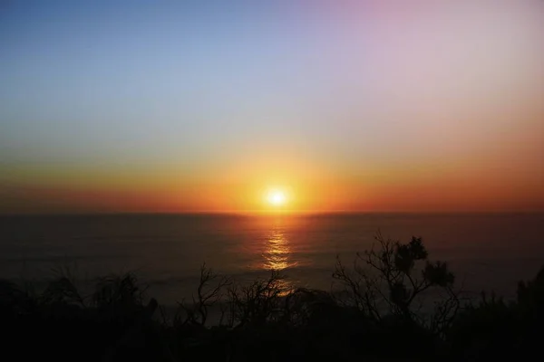 Солнце Садится Над Морем — стоковое фото
