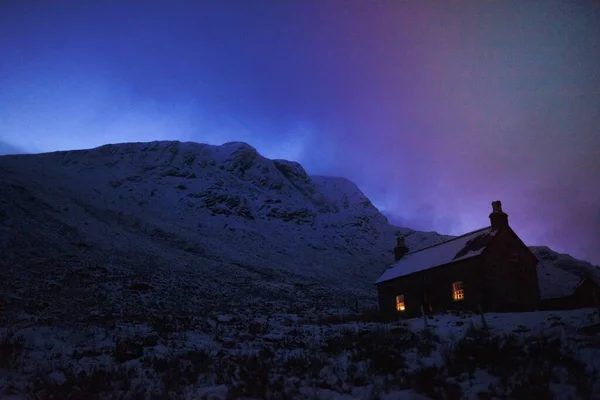 stock image House covered with snow on a misty day