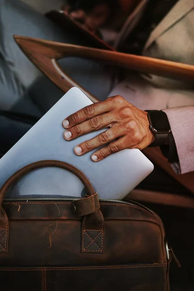 Man Gray Suit Grabbing His Laptop Brown Leather Bag — Stock Photo, Image