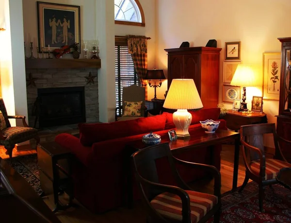 stock image Brown Wooden Console Table Next to Red Loveseat