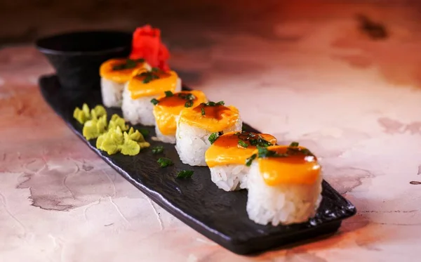 Japanese Dish Rice Rolls Cheese Black Plate — Stok fotoğraf