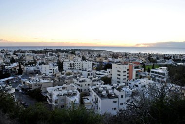 Houses in Cyprus over sunset sun