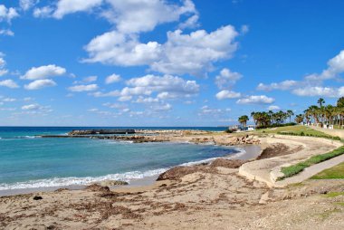 Sand and rocky beach on the sea