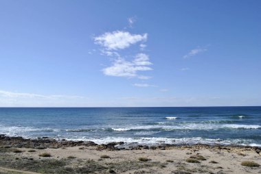 Waves and blue sea on the beach