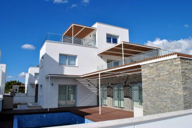Modern white house with swimming pool