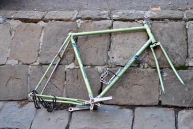 an old rusty metal bicycle