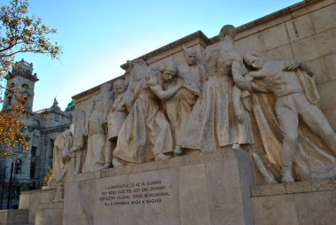 Stone statue of the people