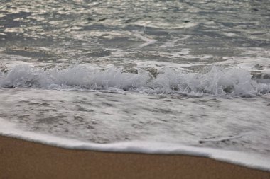 Beach with waves at Falasarna Beach on the island of Crete, Greece clipart