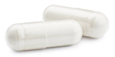 Beyaz arka planda izole edilmiş vitamin takviyesi hapları ya da ilaçlar için beyaz haplar. Kırpma yolu ile hap