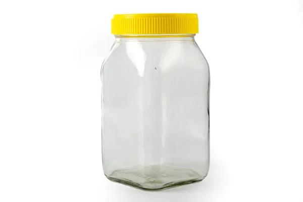 Пустой Прозрачный Стеклянный Сосуд Желтой Крышкой — стоковое фото