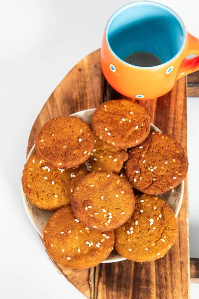 Indian Homemade Cookies on plate, white background, bunch of cookies