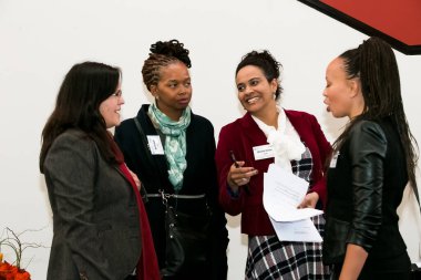 Johannesburg, South Africa - July 14, 2014: Diverse woman networking at corporate convention event