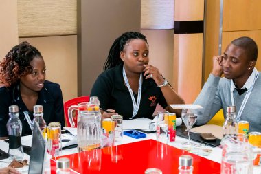 Johannesburg, South Africa - February 24, 2014: Diverse College students attending a business leadership workshop