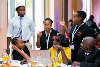 Johannesburg, South Africa - February 24, 2014: Diverse College students attending a business leadership workshop