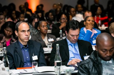 Johannesburg, South Africa - August 20, 2014: Diverse delegates attending a small conference