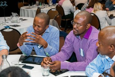 Johannesburg, South Africa - November 28, 2013: Diverse delegates attending a networking and leadership workshop