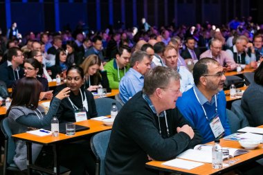 Johannesburg, South Africa - June 25, 2014: Delegates attending a conference in small convention centre