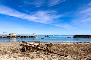 Old jetty in small West Coast town of Port Nolloth, South Africa clipart