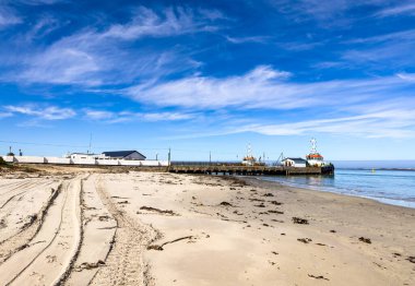 Old jetty in small West Coast town of Port Nolloth, South Africa clipart