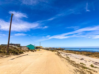 Old fishing village in small West Coast town of Port Nolloth, South Africa clipart