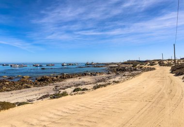 Port Nolloth, Güney Afrika - 16 Mart 2024: Deniz Elmas madencilik tekneleri küçük sahil kasabasında