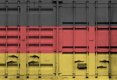 Alman ulusal bayrağını taşıyan konteyner, küresel ticaret bağlamında gümrük tarifeleri ve uluslararası ticaret politikalarını simgeliyor