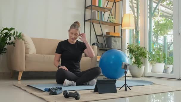 Female Fitness Instructor Wireless Earphones Waving Speaking Video Call Laptop — Vídeos de Stock