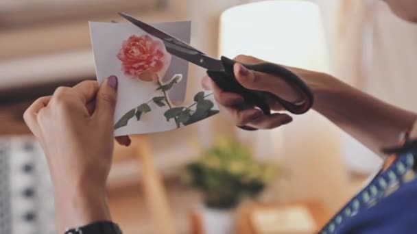 Close Shot Hands Black Woman Cutting Printed Flower Out Paper — Stockvideo
