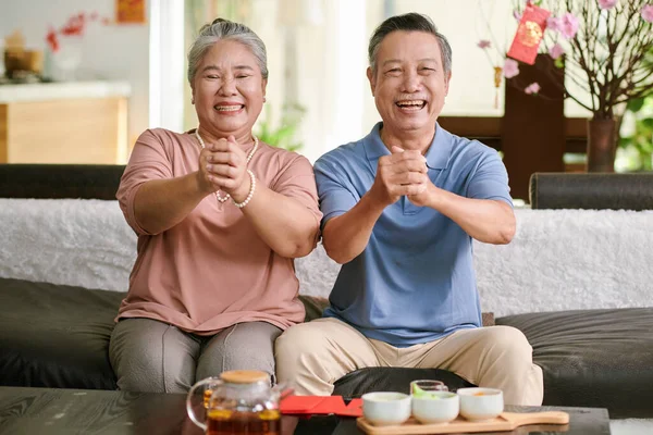 Happy Senior Man Woman Making Greeting Gesture Smiling Camera — стоковое фото