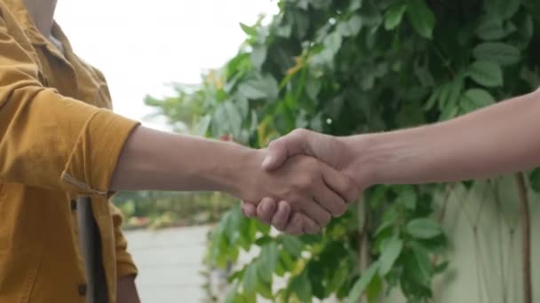 Closeup Two Unrecognizable Mates Shaking Hands Outdoors Greeting Each Other — Stock Video