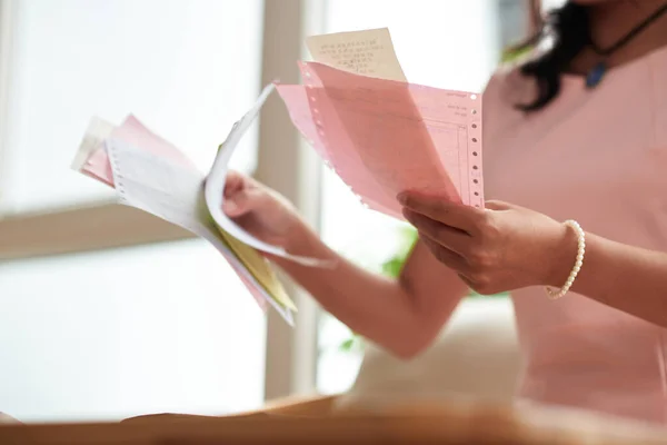 Woman Managing Personal Finances Cheking Her Savings Financial Documents — Stock Fotó