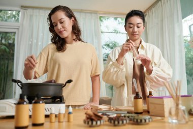 Happy young women crskincare organic soap bars for selling in online shop